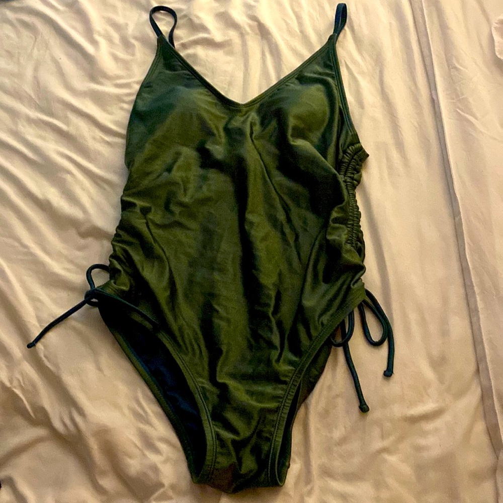 Time true, dark green color, sort of metallic color